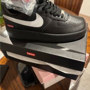 Supreme Black and White Leather Sneakers